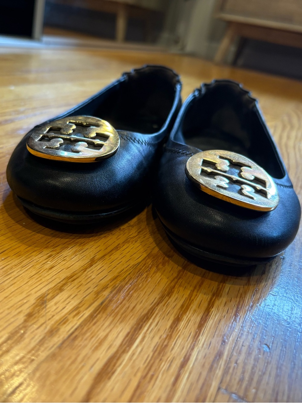 Tory Burch Black Leather Logo Round-Toe Flats with Gold Emblem - Picture 2 of 5